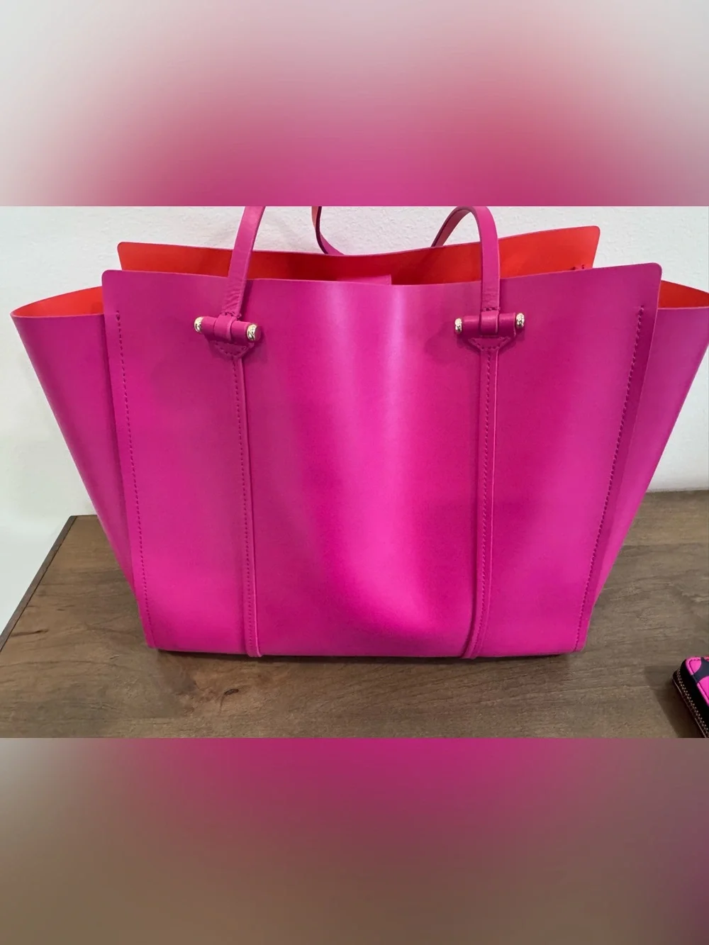 kate spade fuchsia tote with contrasting orange trim and patterned wallet